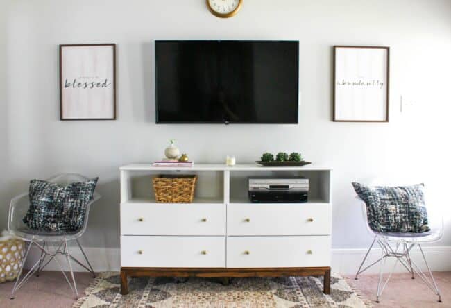 White and wood dresser TV stand.