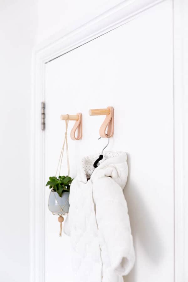 Wood and leather door hooks.