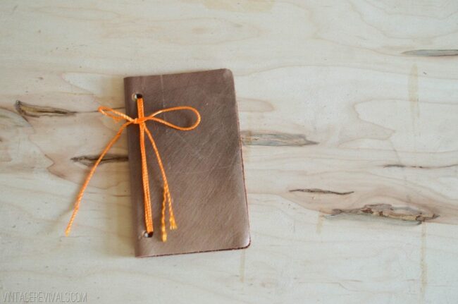 Brown leather notebook.