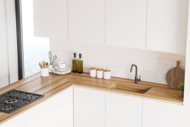 White kitchen with wood countertops