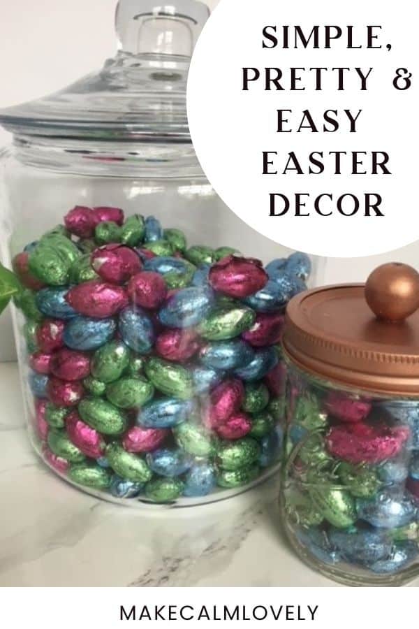 Glass jars full of chocolate eggs.