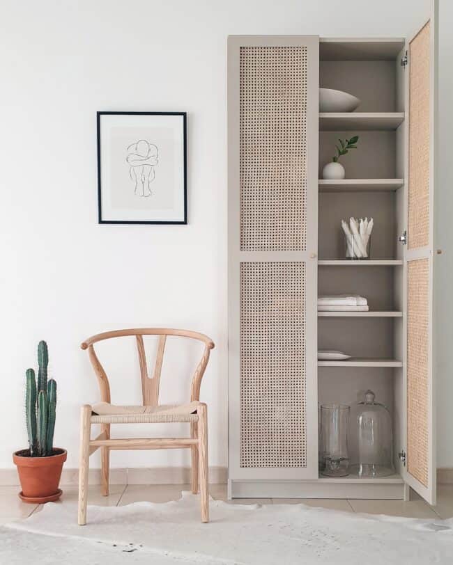 Tall cabinet with cane rattan doors.