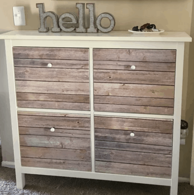 Faux wood front drawers in IKEA Hemnes shoe storage unit.