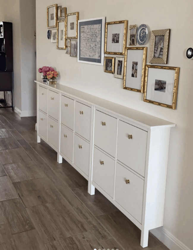 3 IKEA Hemnes shoe storage units together to form long dresser in hallway.