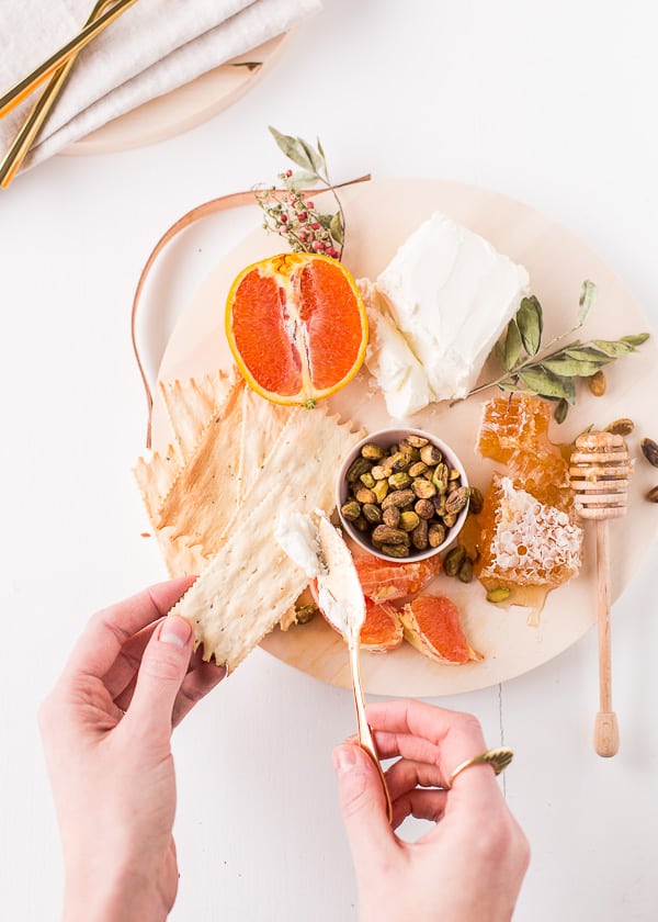 Leather handle cheese board.