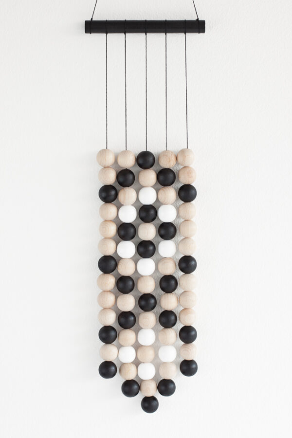 wooden bead wall hanging - black, white and wood