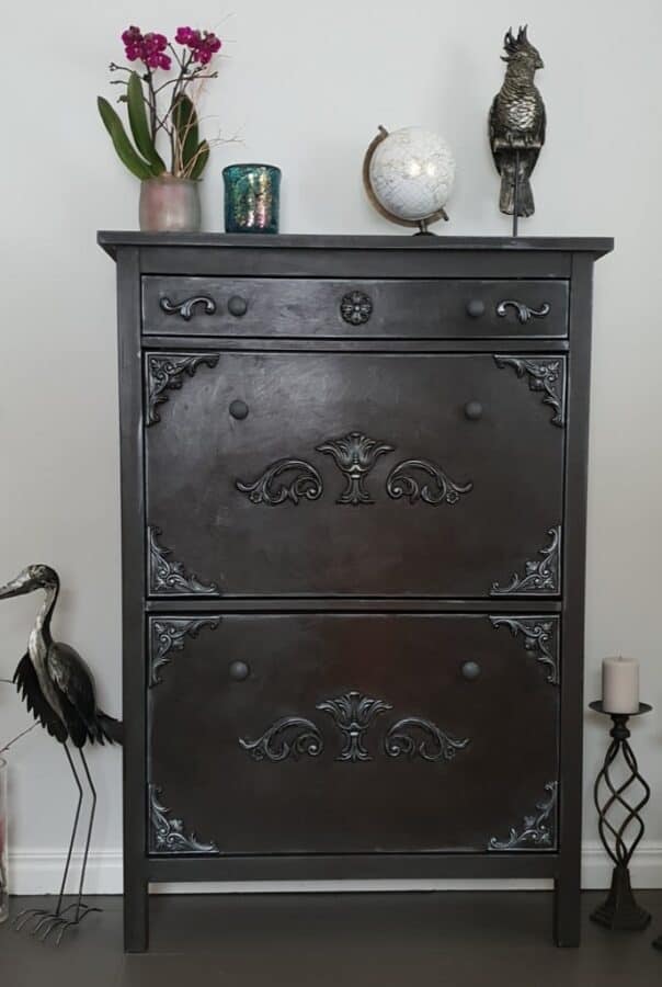 Antique looking dark brown IKEA Hemnes shoe storage unit.