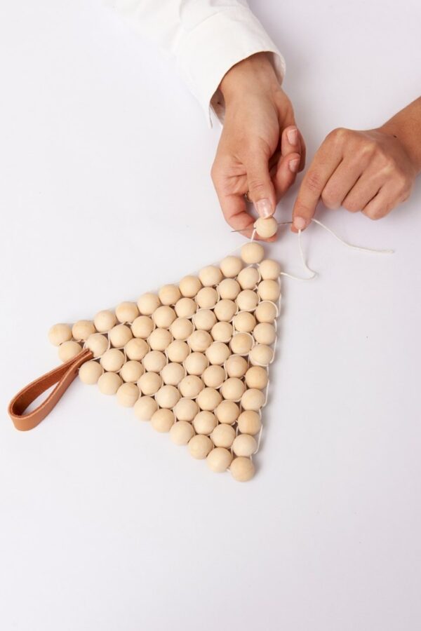 Wooden bead trivet